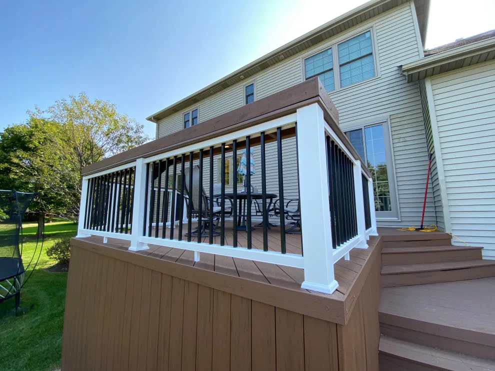Rustic Elm Multi-level TimberTech Deck with Floating Bench in Naperville, IL by Archadeck Of Chicagoland - Photo 10