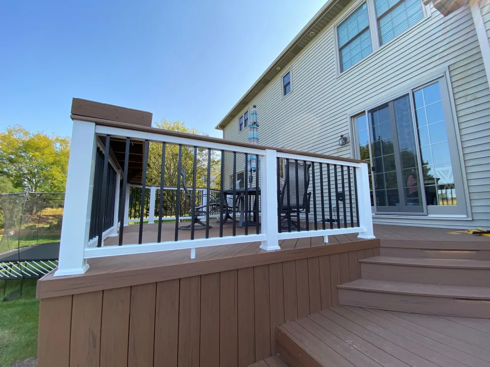Rustic Elm Multi-level TimberTech Deck with Floating Bench in Naperville, IL by Archadeck Of Chicagoland - Photo 8