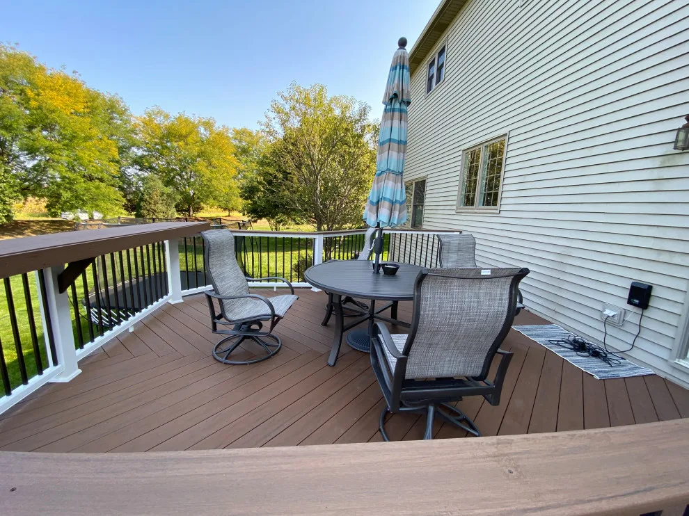Rustic Elm Multi-level TimberTech Deck with Floating Bench in Naperville, IL by Archadeck Of Chicagoland - Photo 7