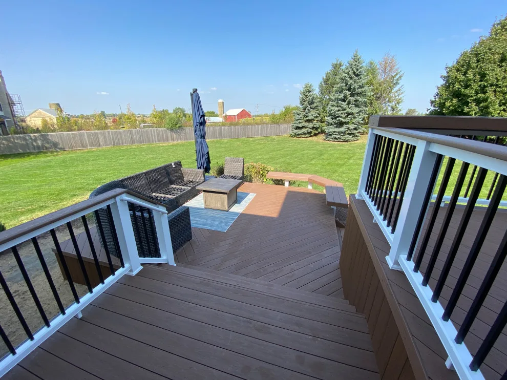 Rustic Elm Multi-level TimberTech Deck with Floating Bench in Naperville, IL by Archadeck Of Chicagoland - Photo 4