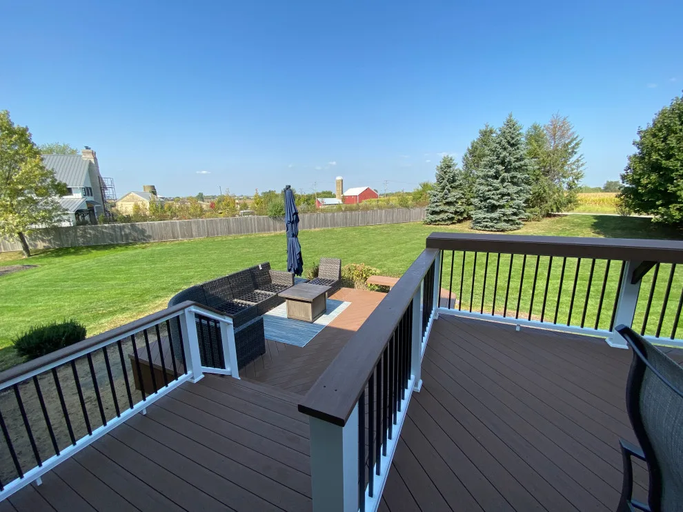 Rustic Elm Multi-level TimberTech Deck with Floating Bench in Naperville, IL by Archadeck Of Chicagoland - Photo 9