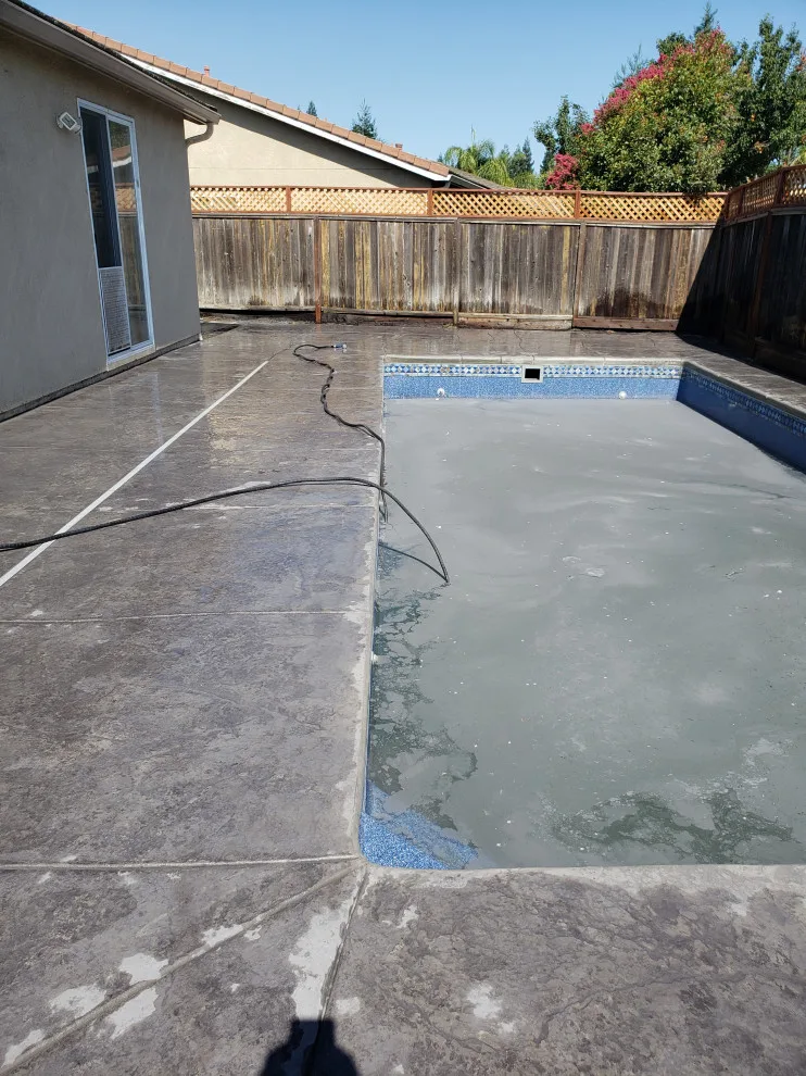 textured concrete pool deck by Craftsman Construction Lic.1030935 - Photo 7