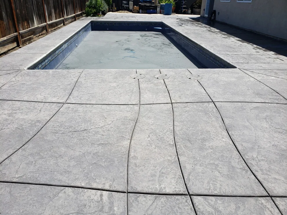 textured concrete pool deck by Craftsman Construction Lic.1030935 - Photo 3
