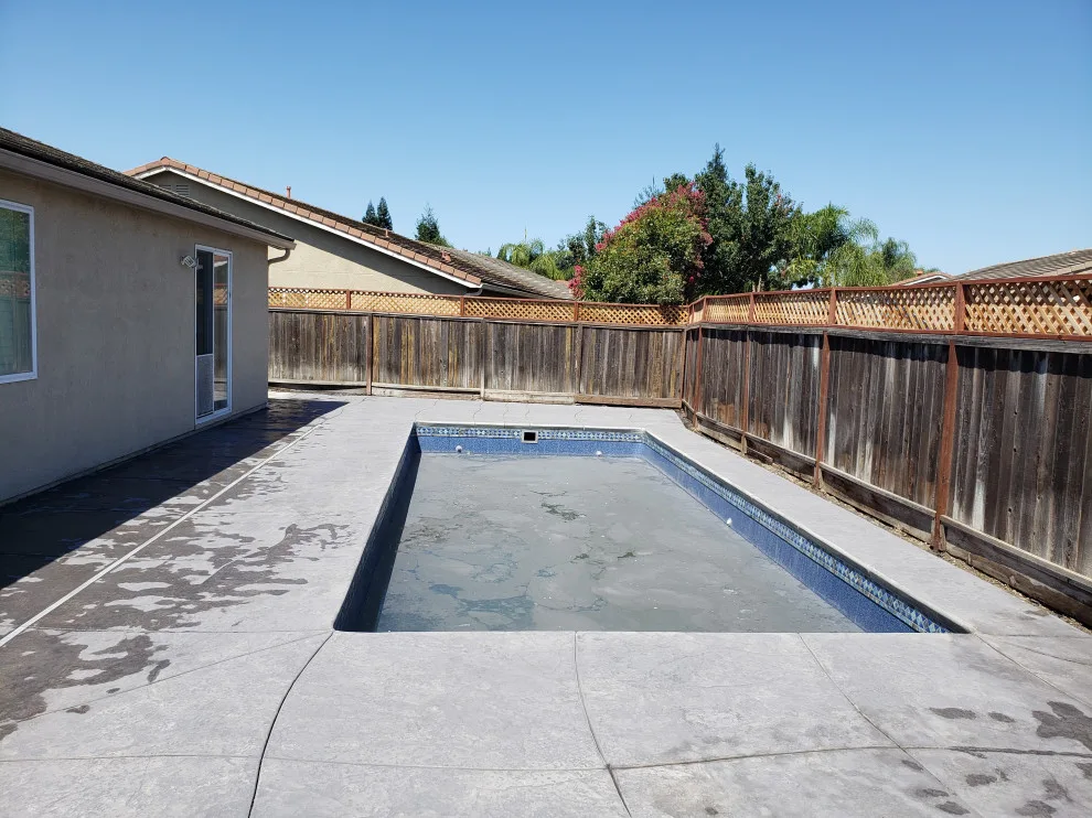 textured concrete pool deck by Craftsman Construction Lic.1030935 - Photo 9