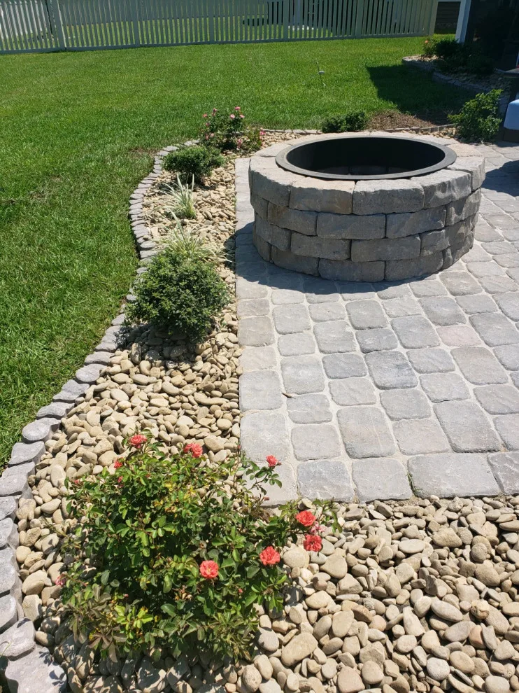 landscaped patio with fire pit installation by Southern Shores Hardscape/Paver Design - Photo 3