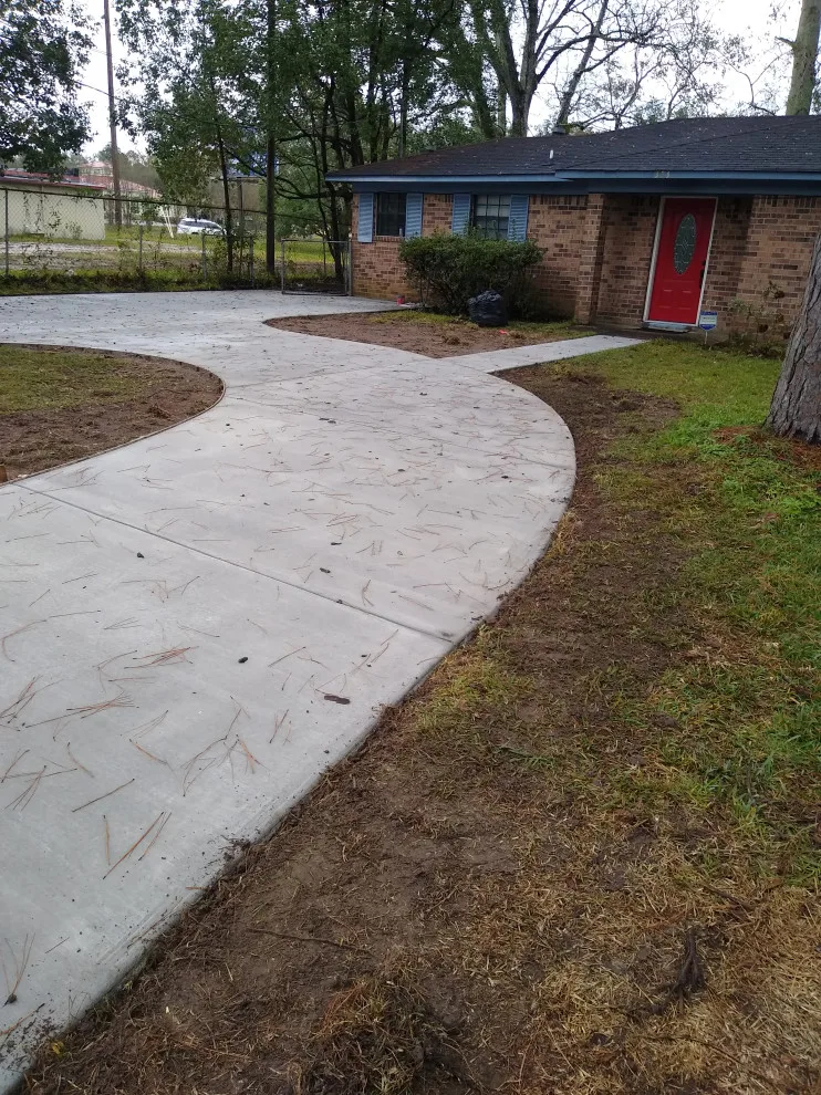 level surface illumination broom finish by R & B Concrete Co. - Photo 3