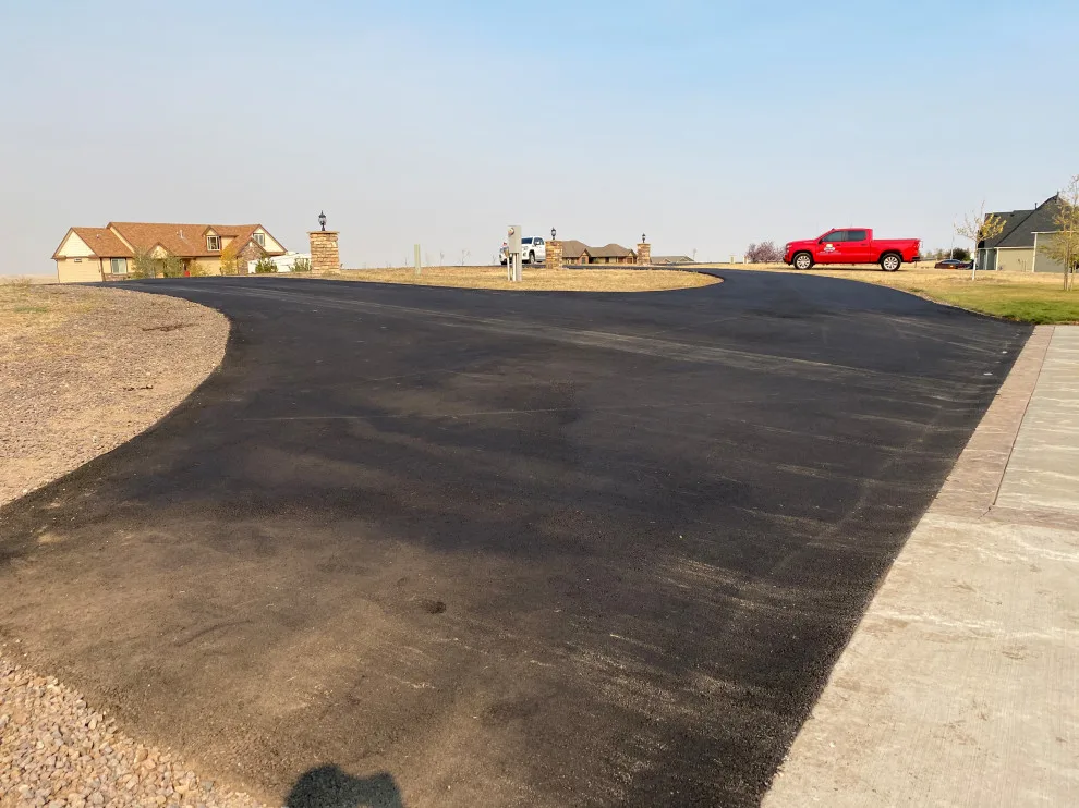 Paving with asphalt by Blacktop Plus - Photo 17