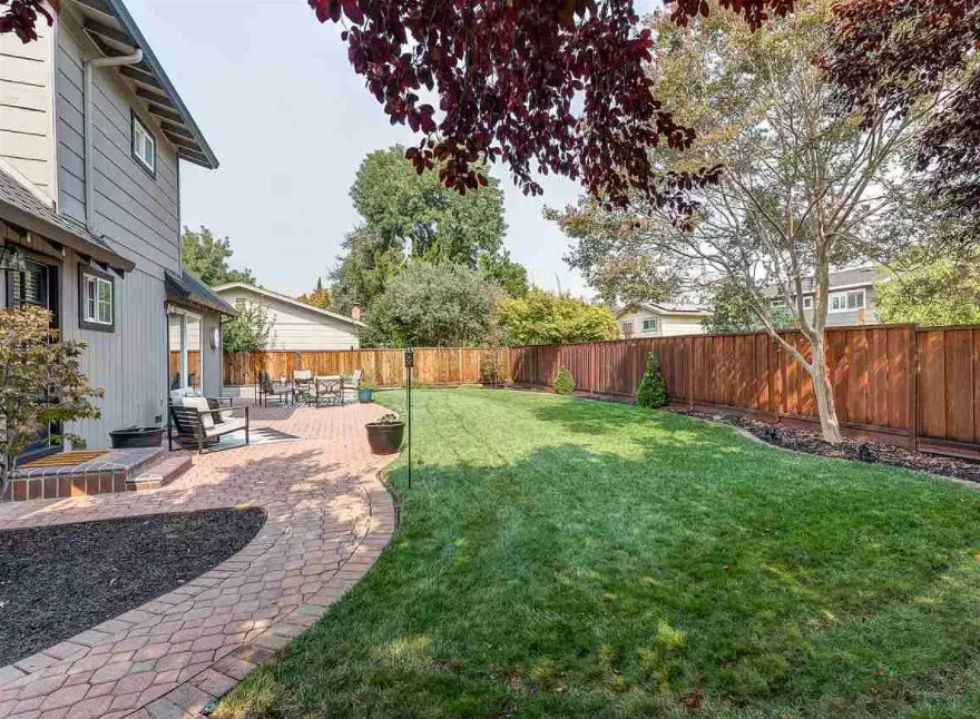 Outdoor Paver Patio with Pathway by Naulu Concrete Construction - Photo 7