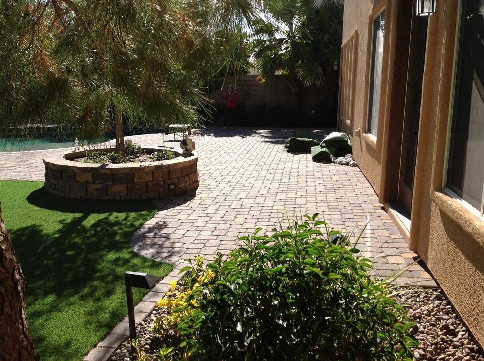 Backyard by Sunny Landscaping - Photo 13