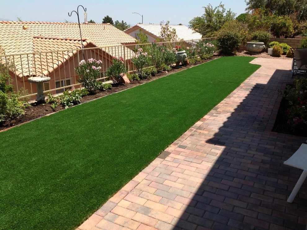 Backyard by Sunny Landscaping - Photo 17