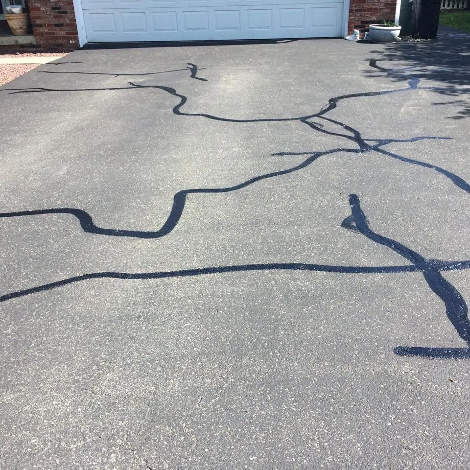 Warm Gap Sealing and Repair by Prestige Sealcoating & Striping LLC - Photo 3