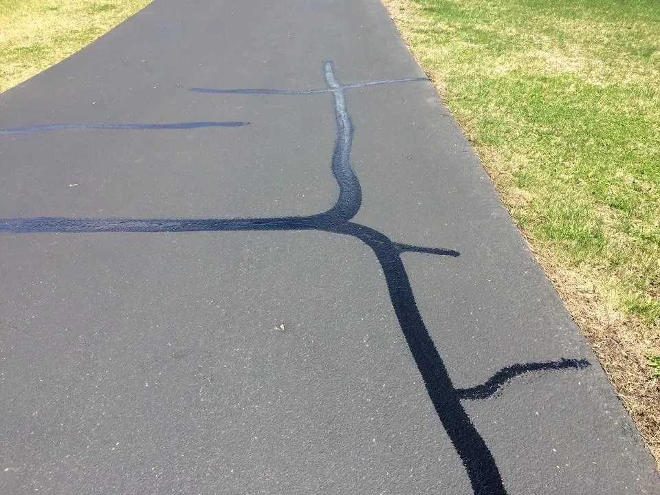 Warm Gap Sealing and Repair by Prestige Sealcoating & Striping LLC - Photo 4