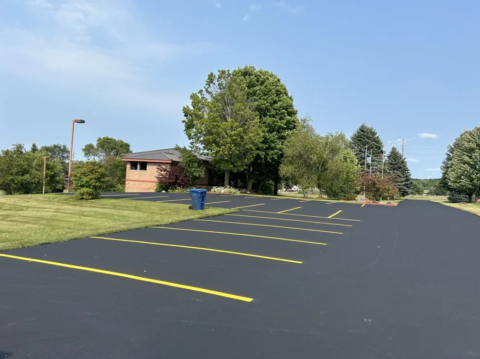 Parking Space Marking by Grand Traverse Sealcoating & Striping - Photo 10