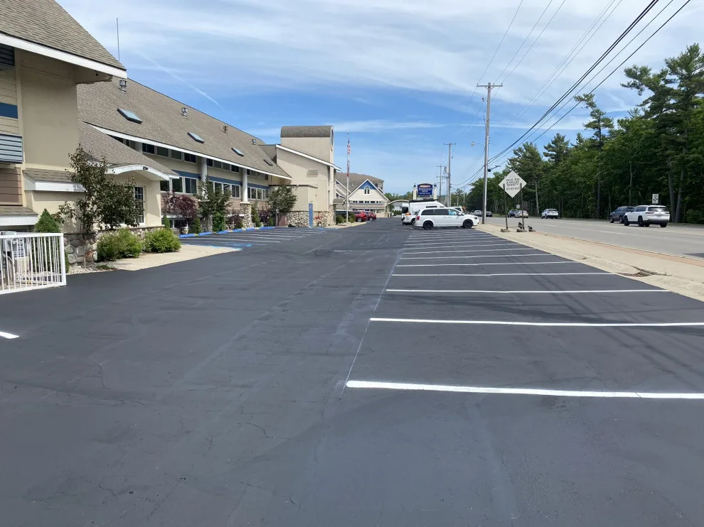 Parking Space Marking by Grand Traverse Sealcoating & Striping - Photo 6