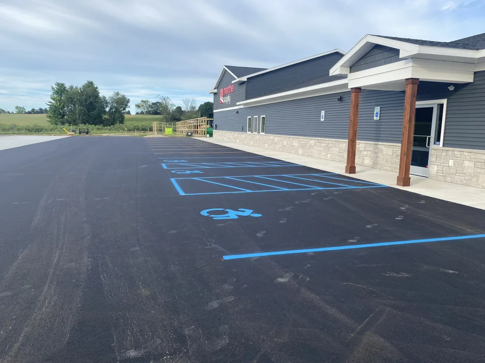 Parking Space Marking by Grand Traverse Sealcoating & Striping - Photo 12