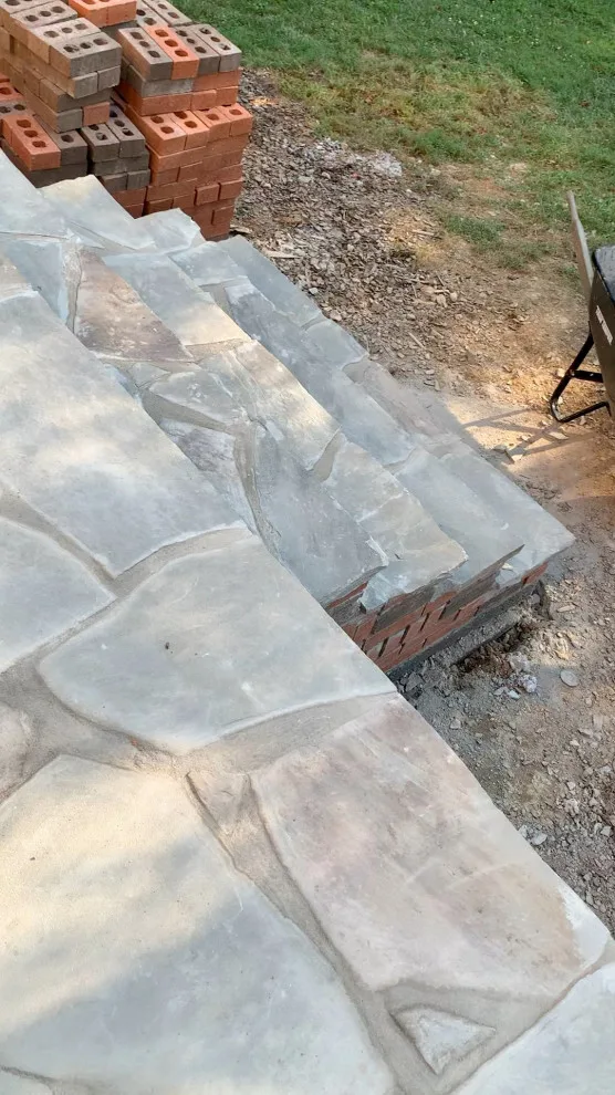 Installation of a stone patio by Gonzalez Construction Co - Photo 4