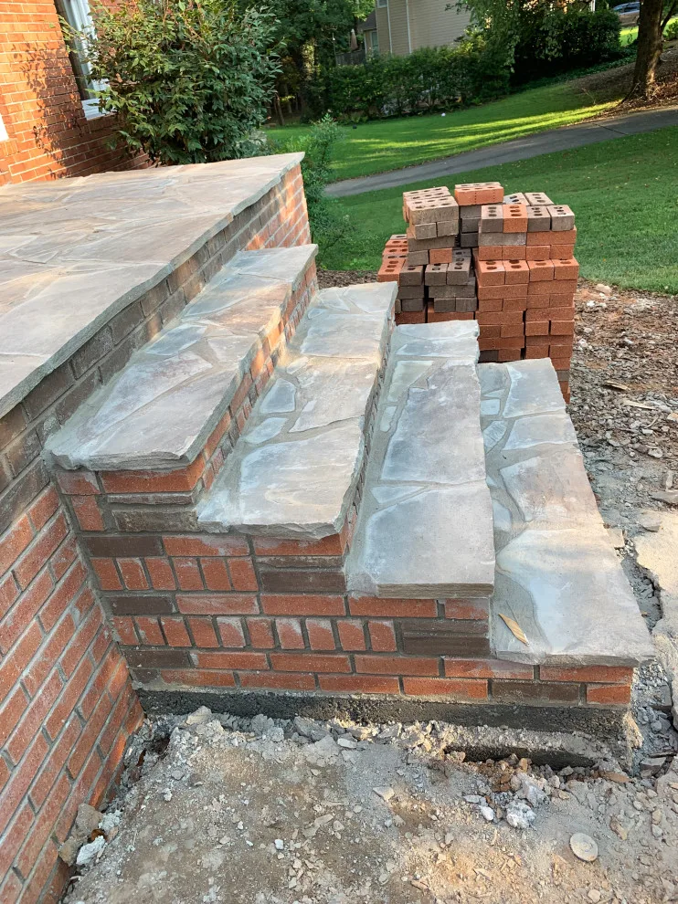 Installation of a stone patio by Gonzalez Construction Co - Photo 2