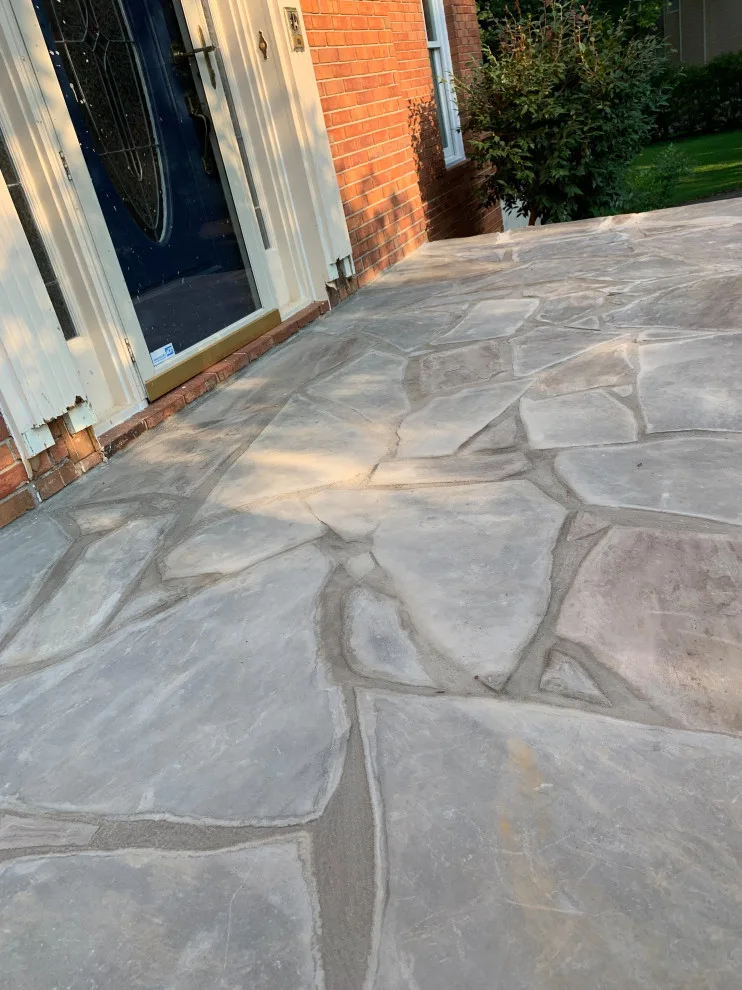 Installation of a stone patio by Gonzalez Construction Co - Photo 3