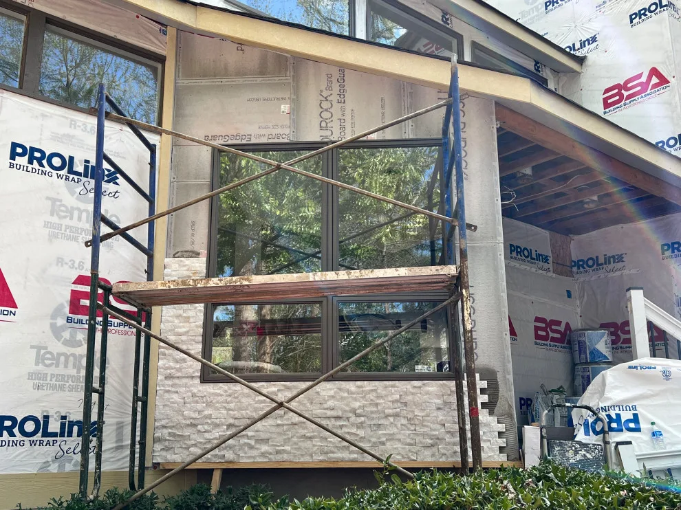 Contemporary Stone Facade by Gonzalez Construction Co - Photo 5