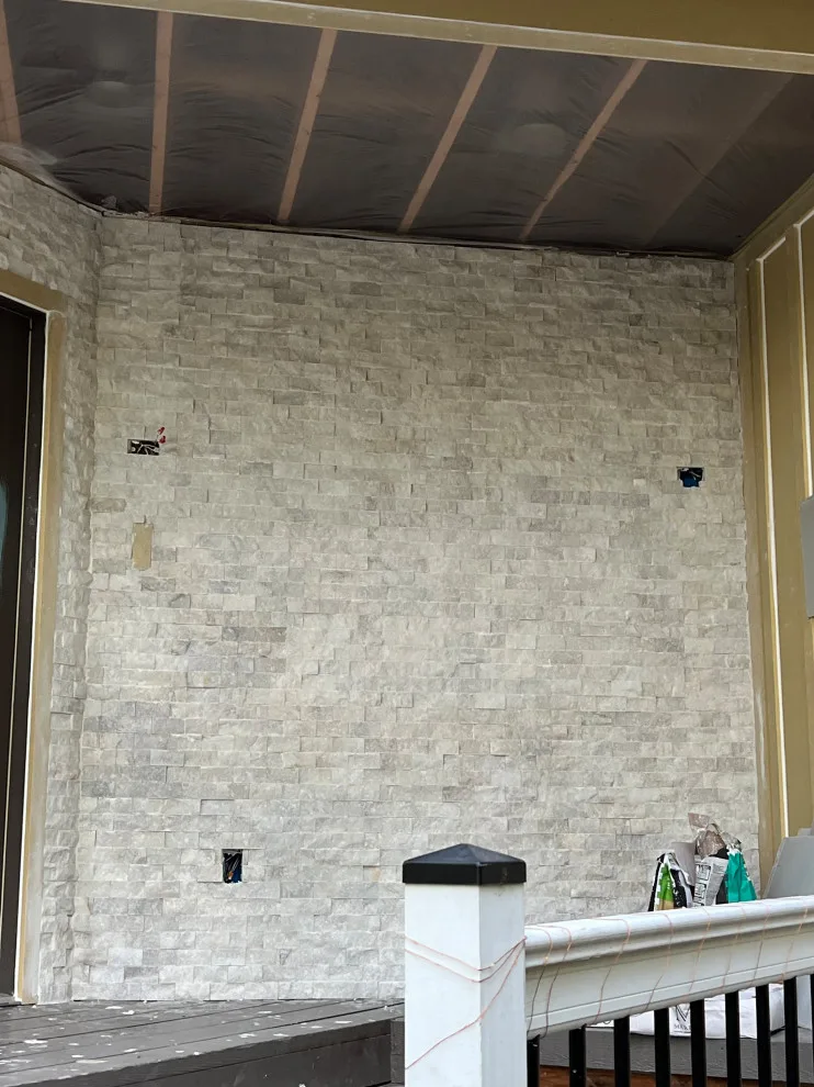 Contemporary Stone Facade by Gonzalez Construction Co - Photo 8