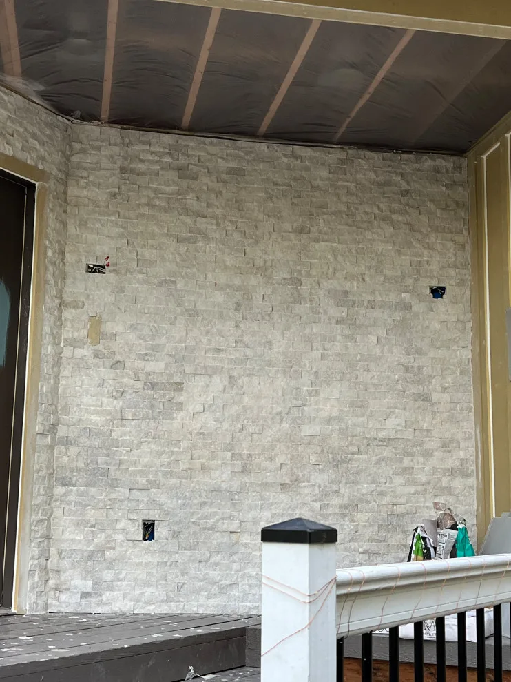 Contemporary Stone Facade by Gonzalez Construction Co - Photo 3
