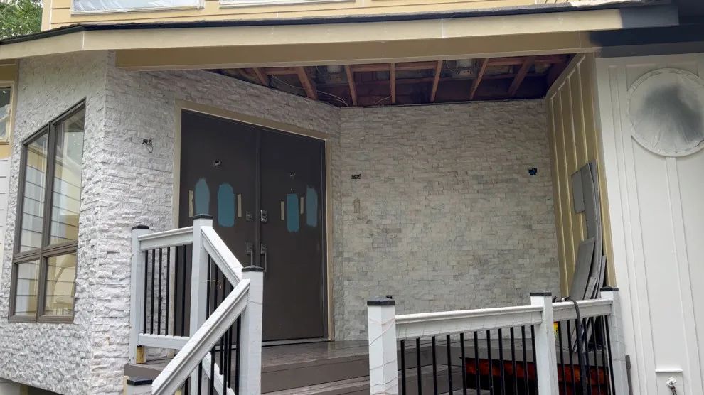 Contemporary Stone Facade by Gonzalez Construction Co - Photo 2