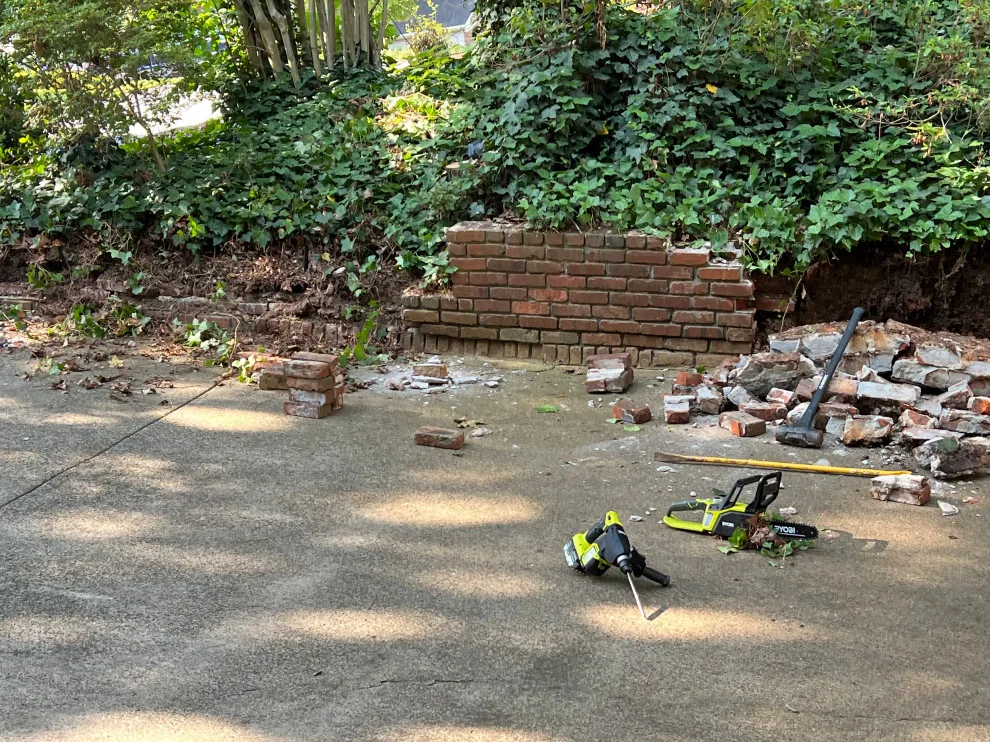 Brick Retaining Wall Restoration by Gonzalez Construction Co - Photo 3