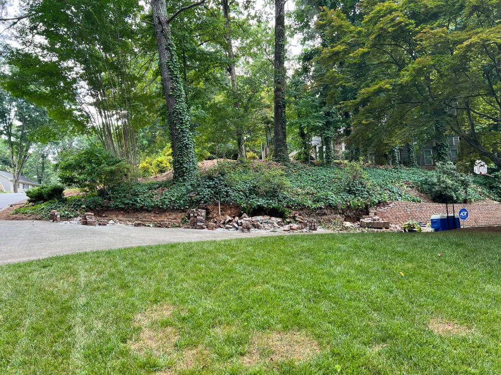 Brick Retaining Wall Restoration by Gonzalez Construction Co - Photo 4