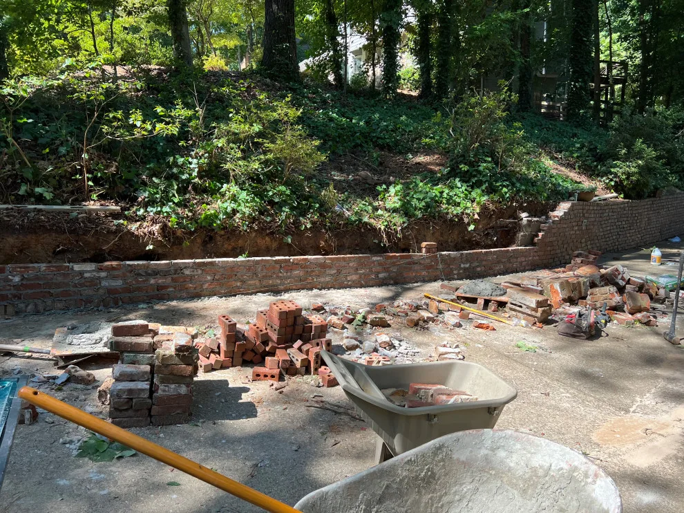 Brick Retaining Wall Restoration by Gonzalez Construction Co - Photo 6
