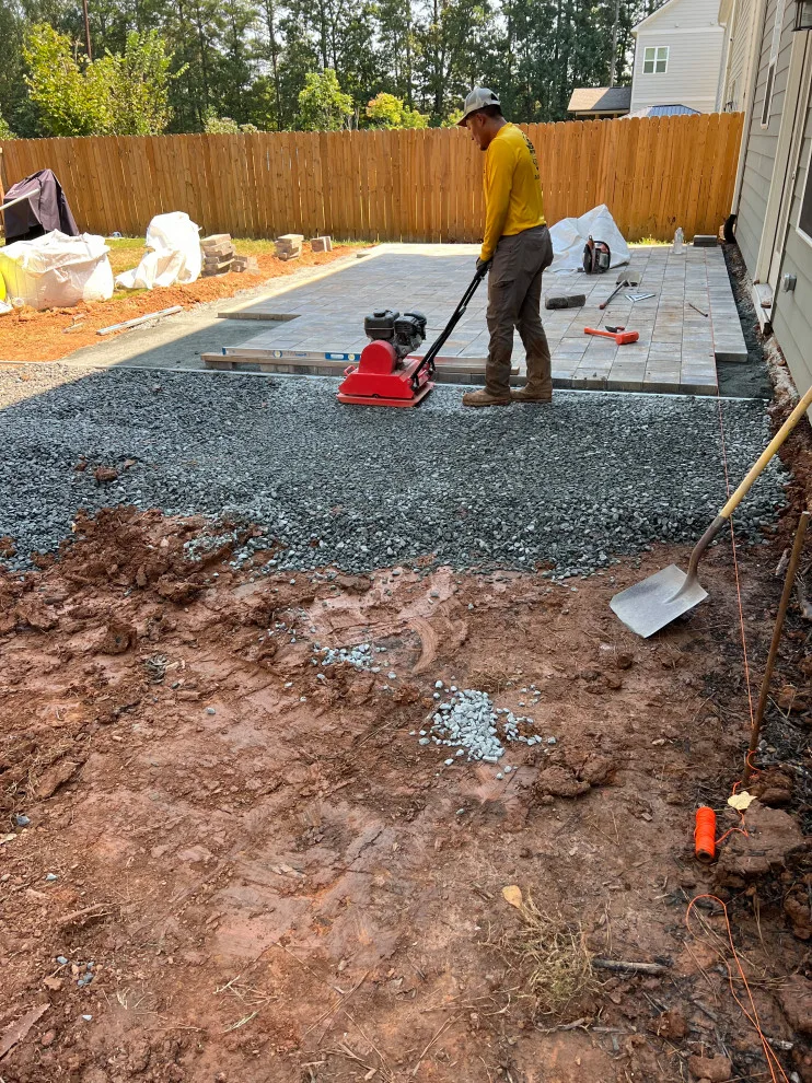 Sierra pavers installation along with firepit and seating wall by Gonzalez Construction Co - Photo 3