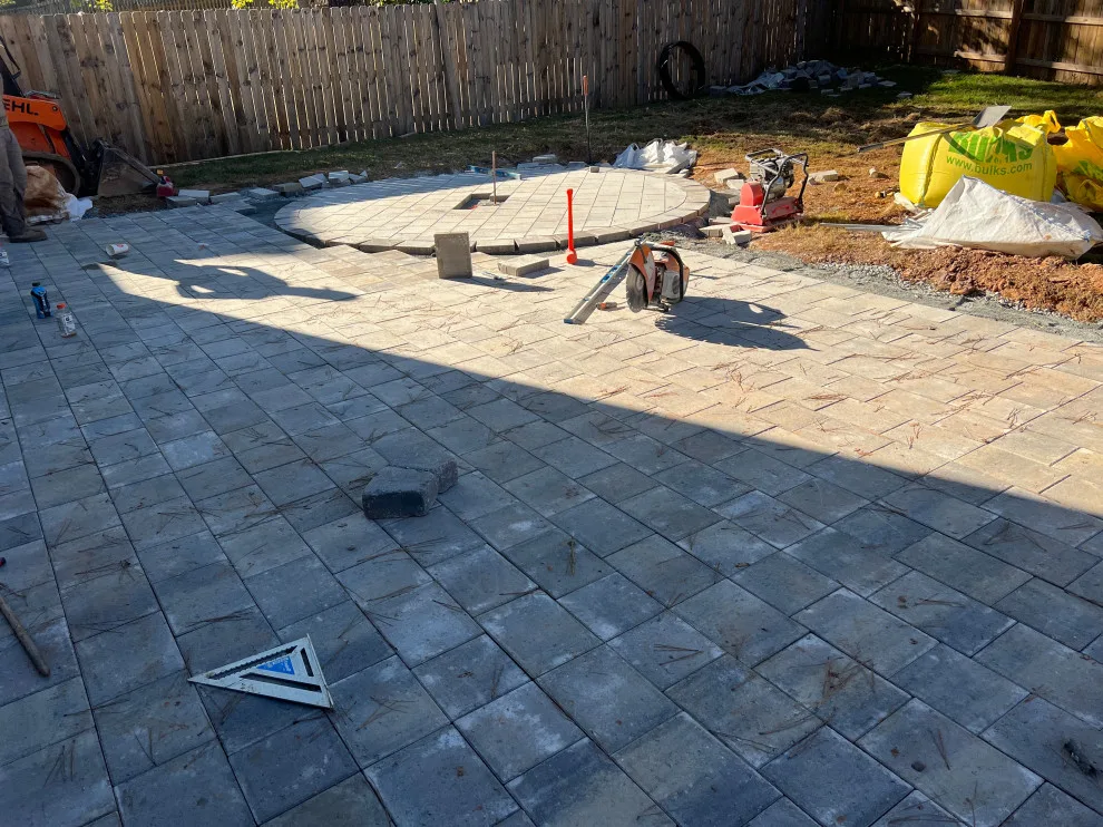 Sierra pavers installation along with firepit and seating wall by Gonzalez Construction Co - Photo 5