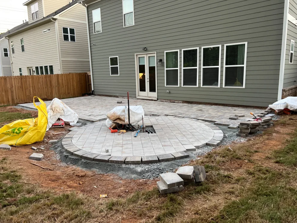 Sierra pavers installation along with firepit and seating wall by Gonzalez Construction Co - Photo 4