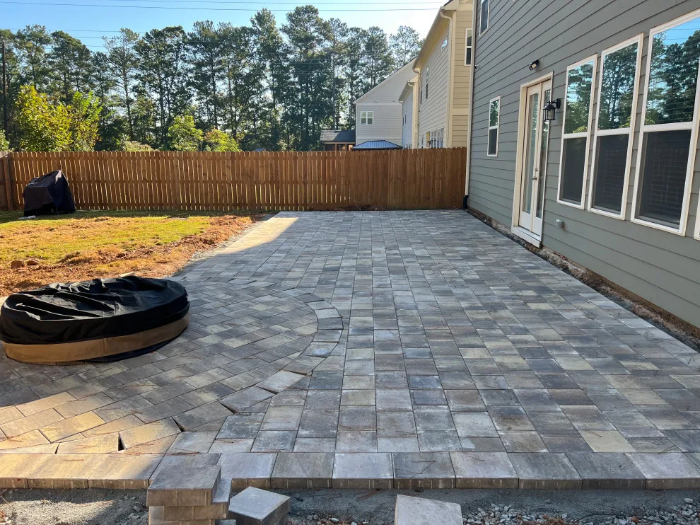 Sierra pavers installation along with firepit and seating wall by Gonzalez Construction Co - Photo 7