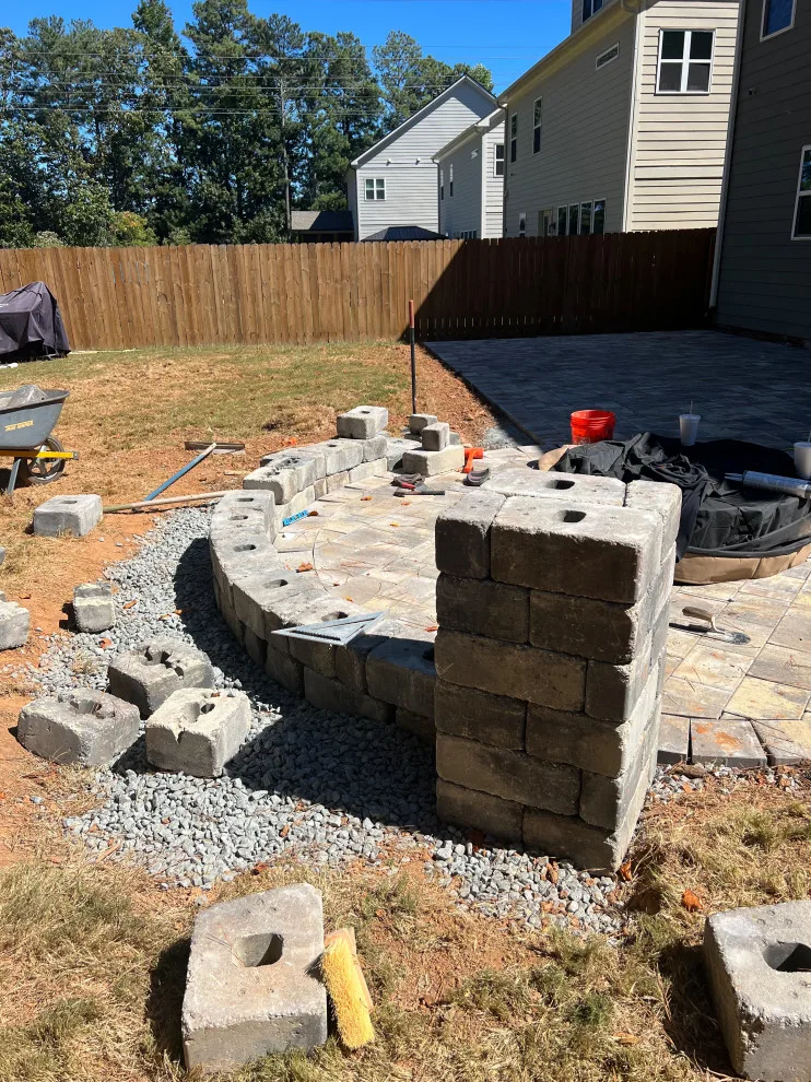 Sierra pavers installation along with firepit and seating wall by Gonzalez Construction Co - Photo 9