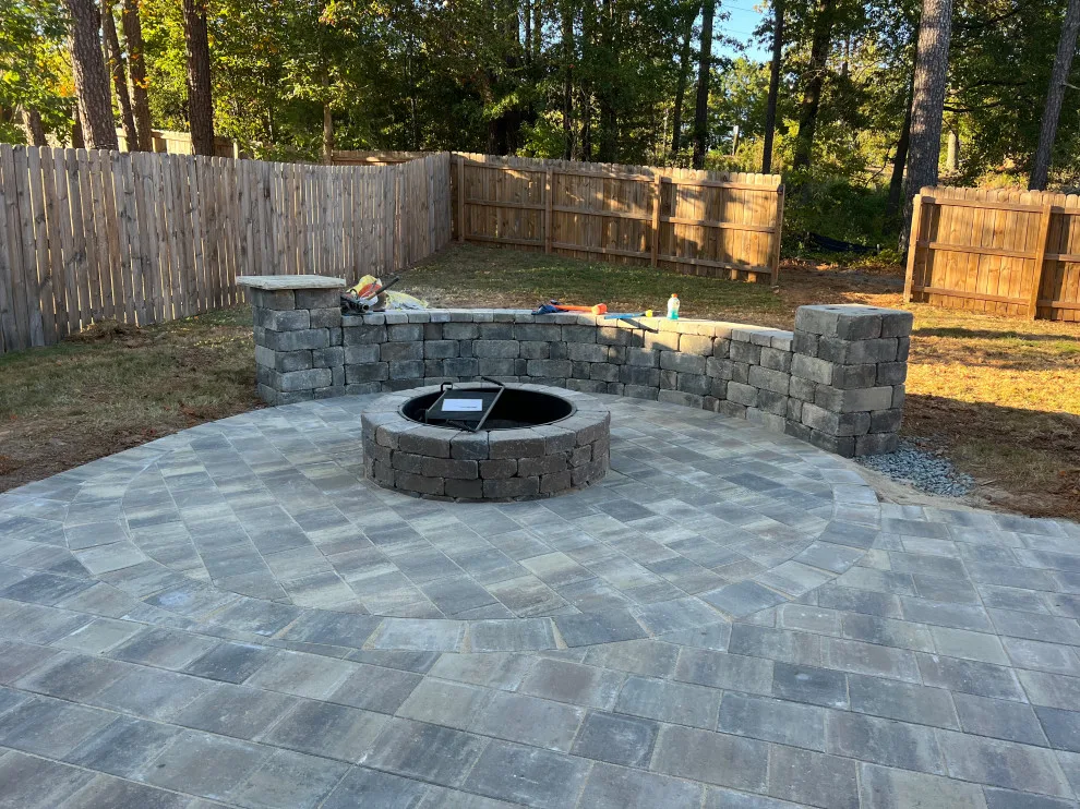 Sierra pavers installation along with firepit and seating wall by Gonzalez Construction Co - Photo 2