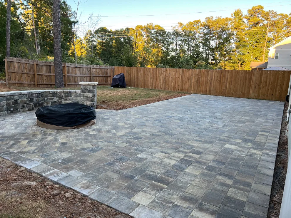 Sierra pavers installation along with firepit and seating wall by Gonzalez Construction Co - Photo 10