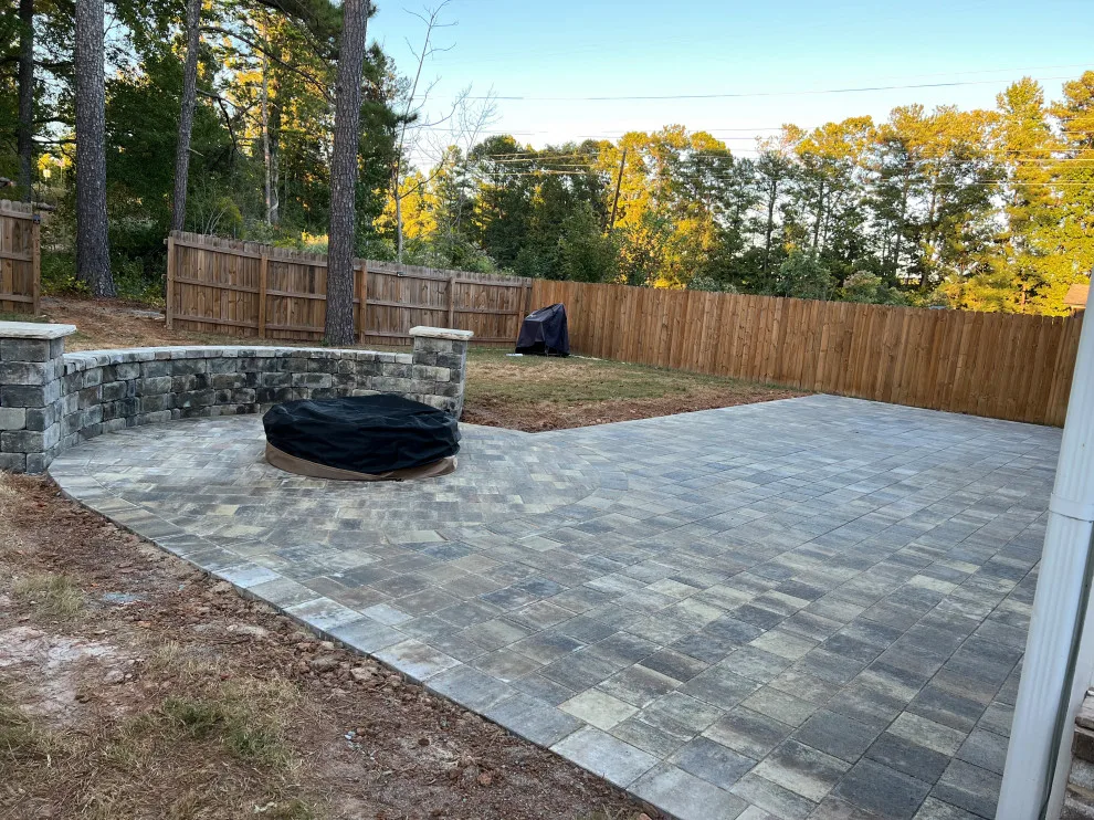 Sierra pavers installation along with firepit and seating wall by Gonzalez Construction Co - Photo 8