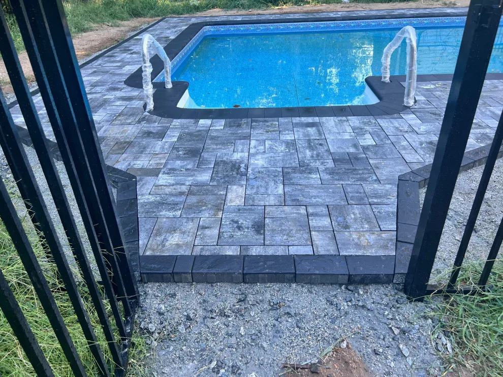 Paver installation around the swimming pool by Five Star Contractors - Photo 6