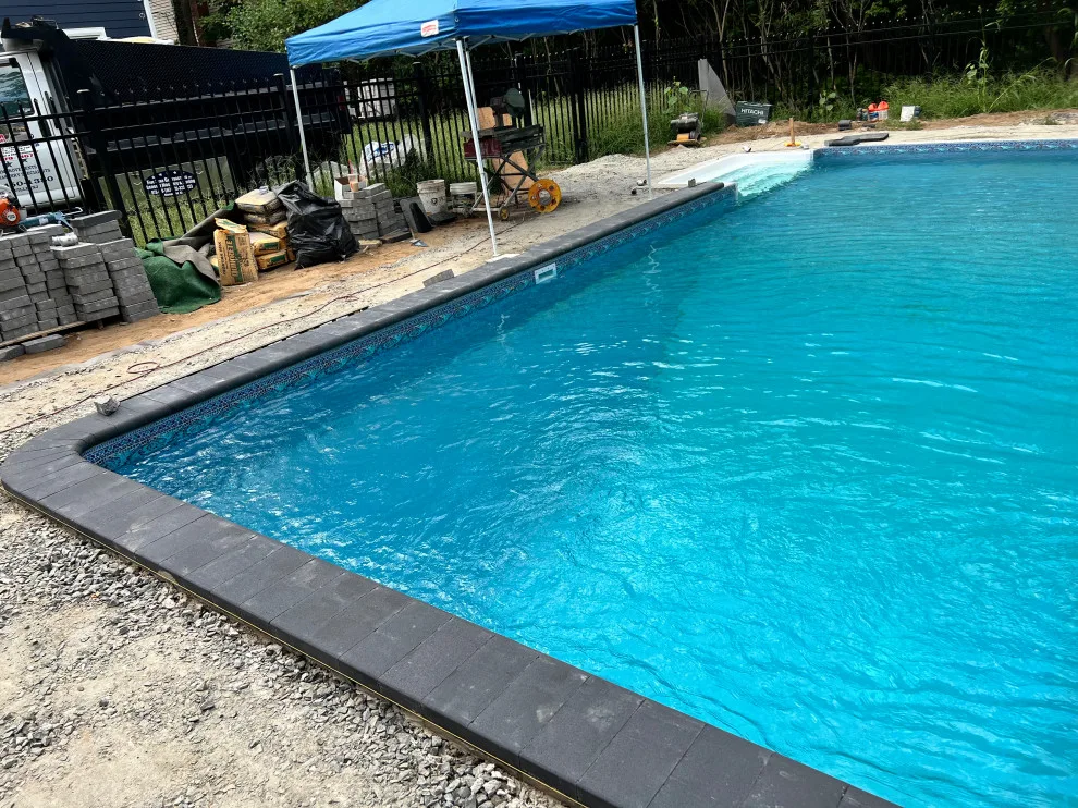 Paver installation around the swimming pool by Five Star Contractors - Photo 14