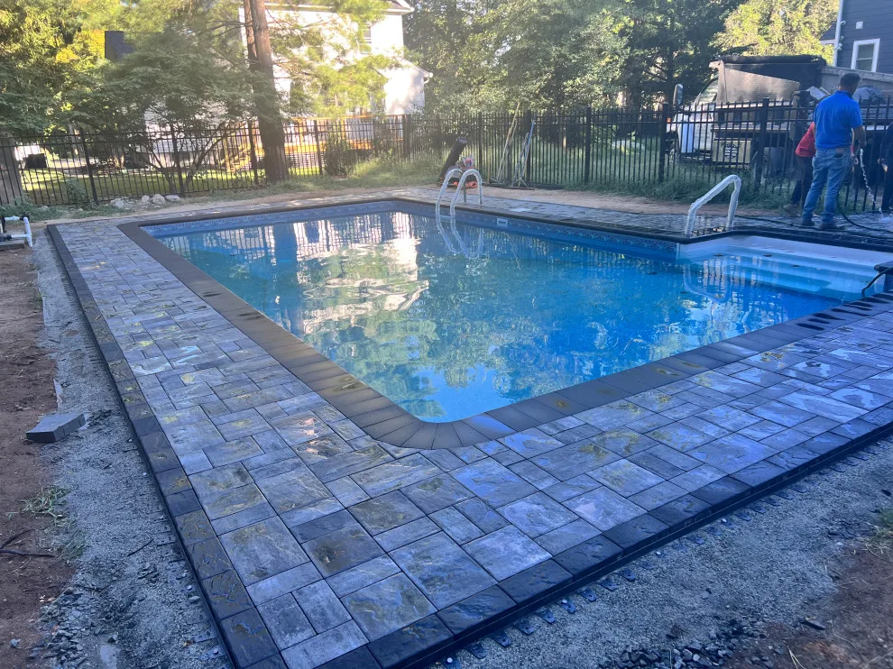 Paver installation around the swimming pool by Five Star Contractors - Photo 5