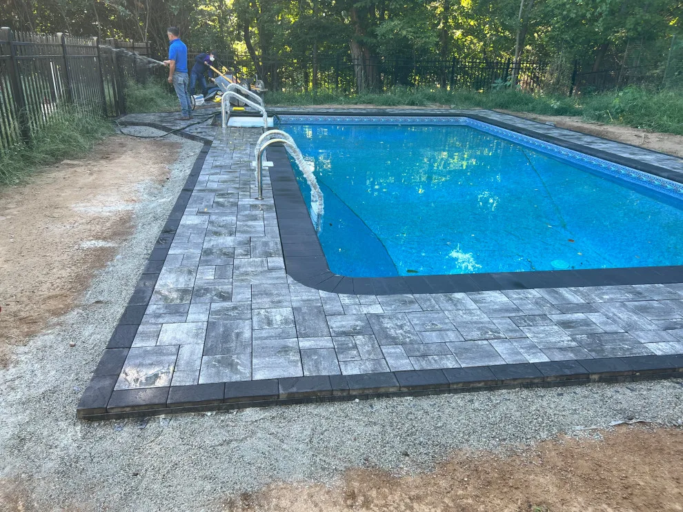 Paver installation around the swimming pool by Five Star Contractors - Photo 8