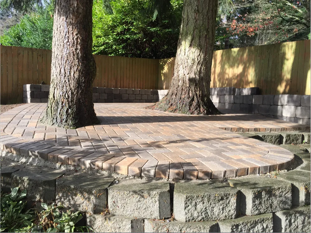Elevated Flower Bed Back Patio by Xavier Pavers - Photo 8