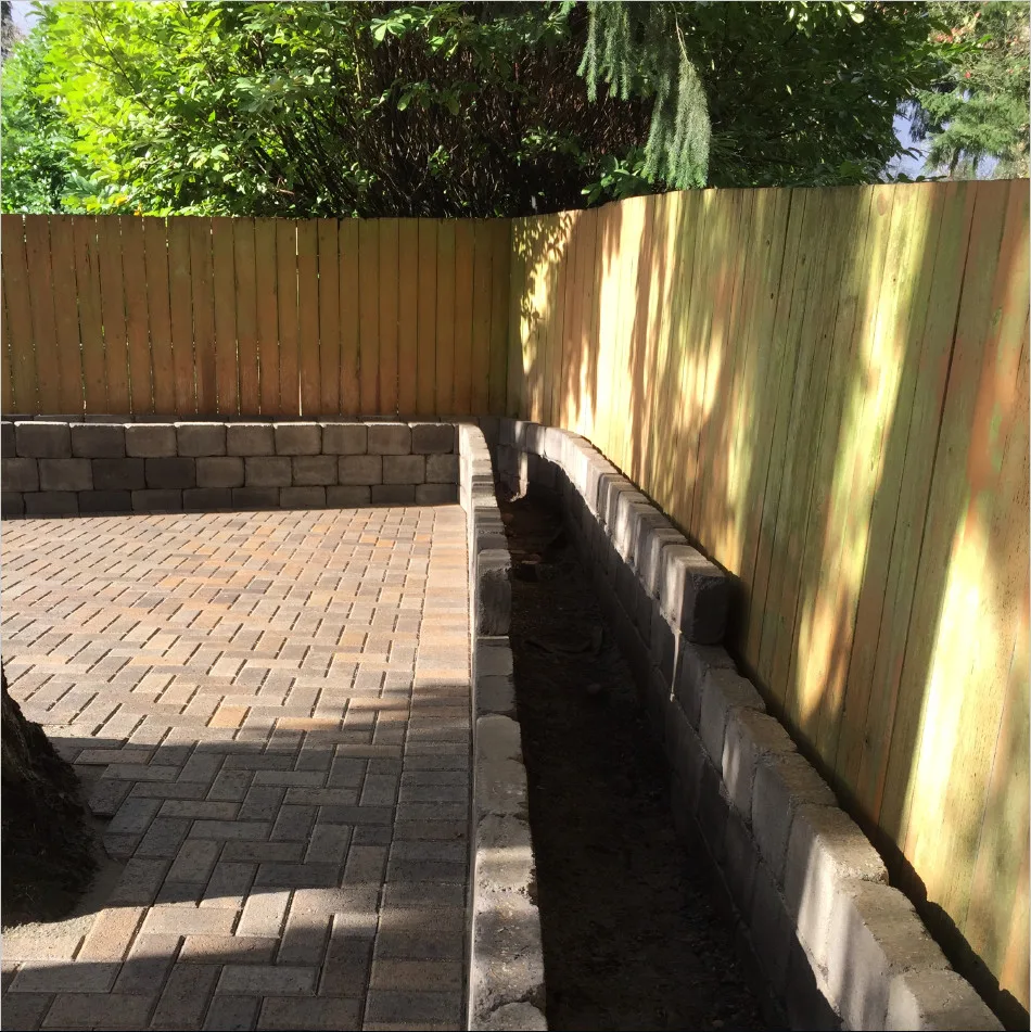 Elevated Flower Bed Back Patio by Xavier Pavers - Photo 6