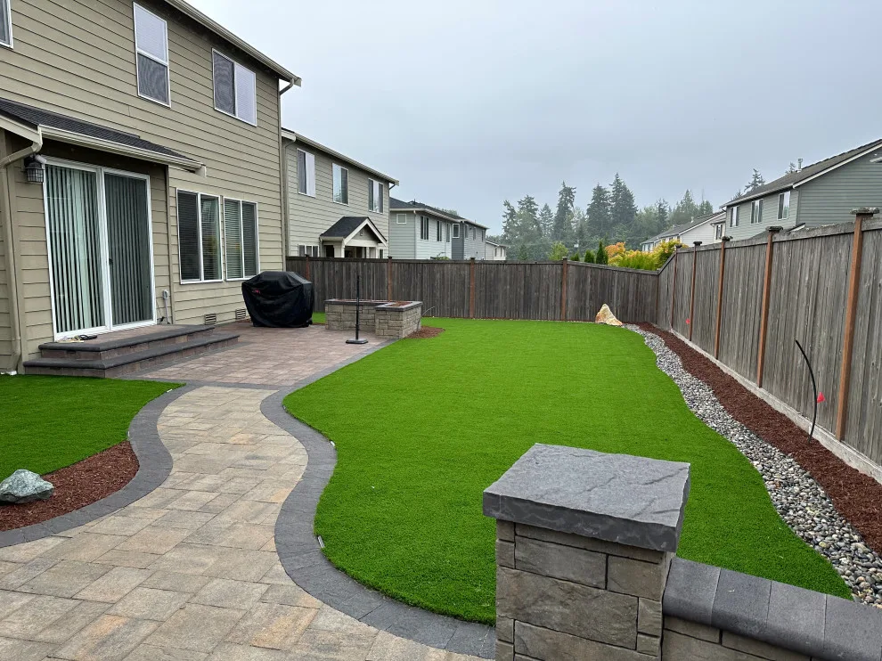 Elevated Flower Bed Back Patio by Xavier Pavers - Photo 4