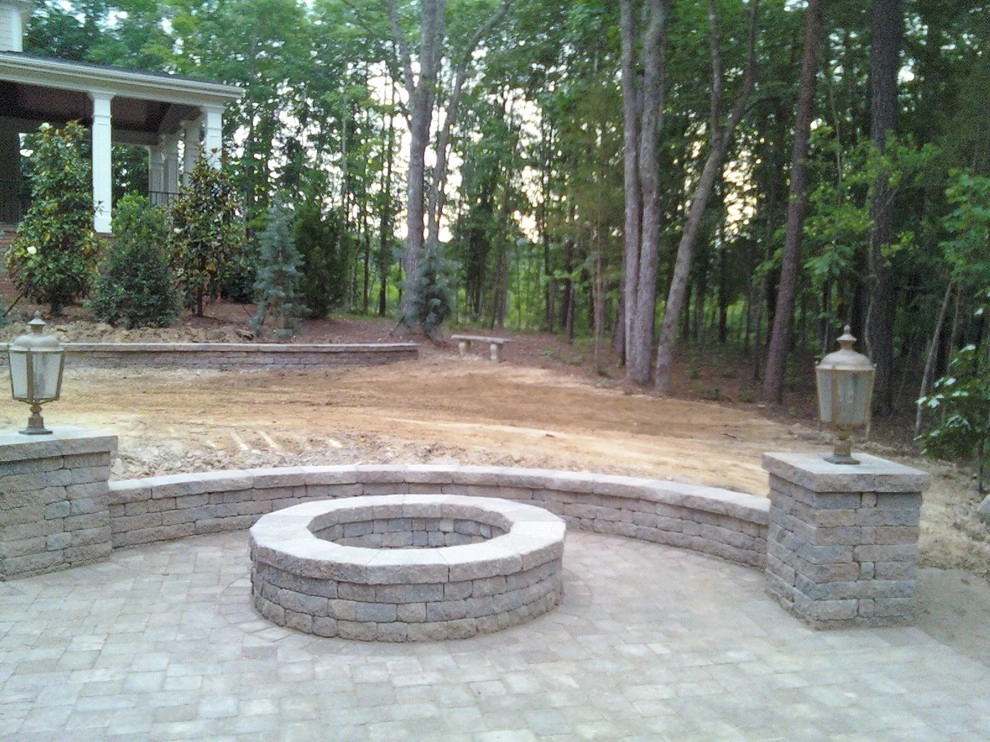 Custom Patio with Sitting Wall and Firepit by Sutton Outdoor, LLC - Photo 3