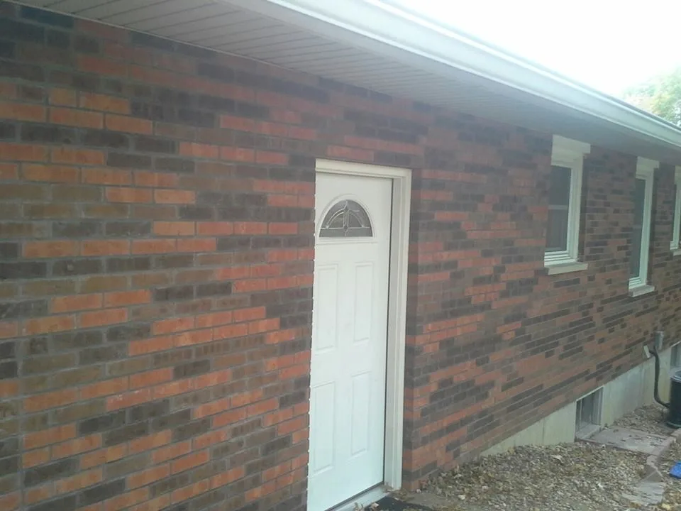 Garage Brick Reconstruction: Before and After by Masterpiece Masonry - Photo 2