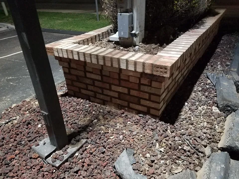 Planter and Brick Sign Renovation by Masterpiece Masonry - Photo 4