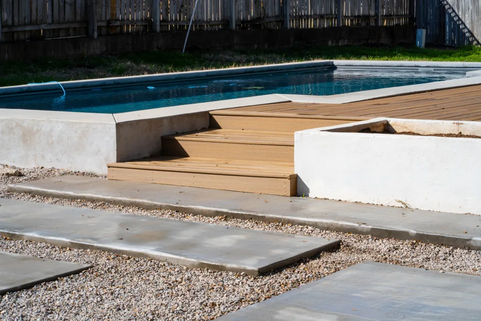 Custom Concrete Patio and Stucco Planters with Composite Pool Deck by BioScapes LLC - Photo 9