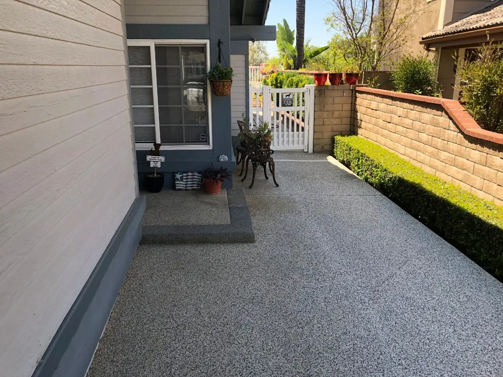 Pavers above Pebble Tec Coating by Pavescapesinc - Photo 6