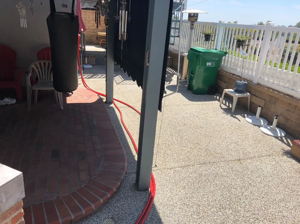 Pavers above Pebble Tec Coating by Pavescapesinc - Photo 3
